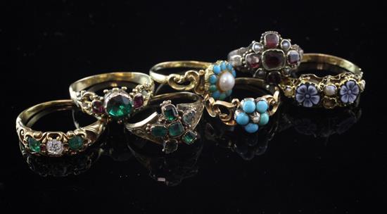 Seven assorted late Victorian and Edwardian gold and gem set rings, various sizes.